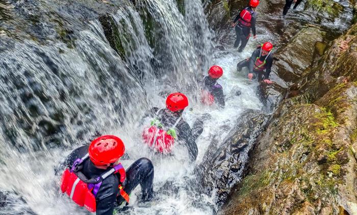Climb, swim and slide through a pristine Welsh river.



An offsite adventure where you will traverse, jump, scramble, slide and swim to descend t